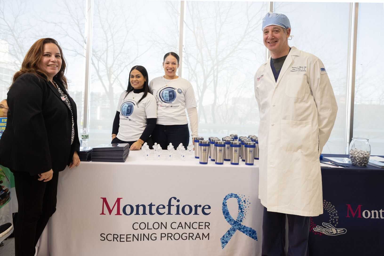 Healthcare providers at a screening table