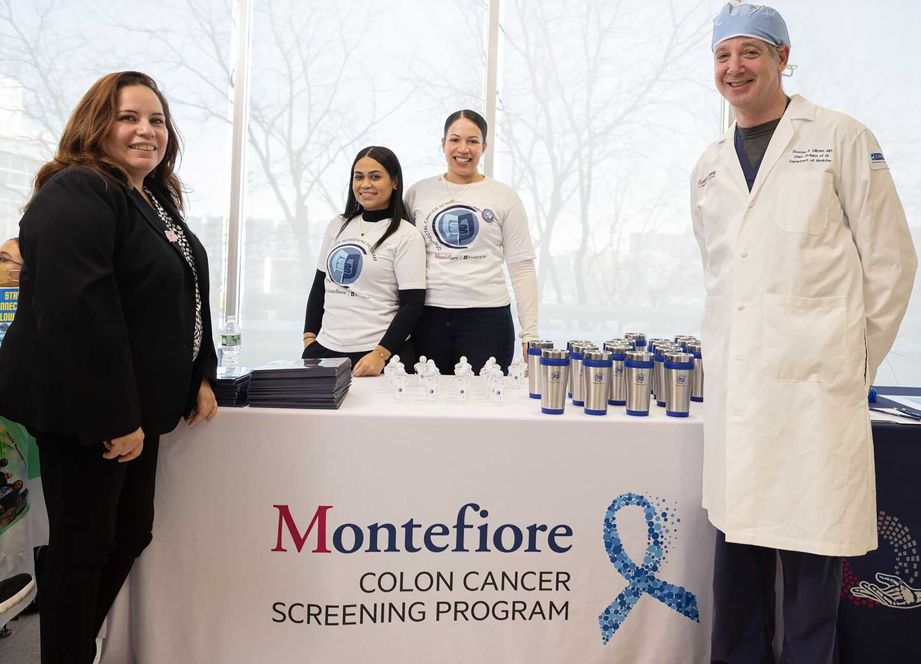 Healthcare providers at a screening table